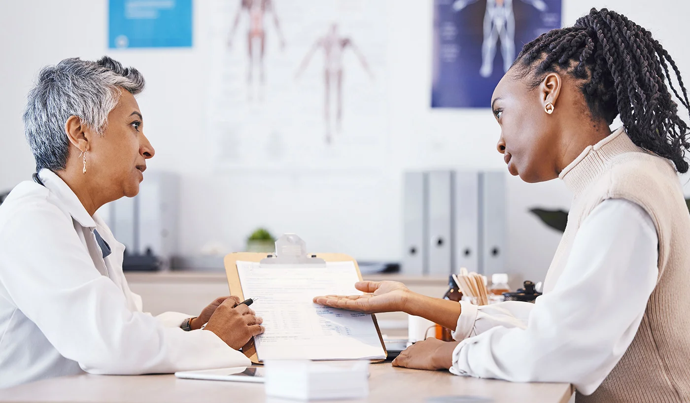 Black-woman-in-heart-check-up-with-the-doctor